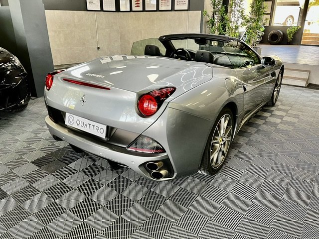 Silver Ferrari California, rear three-quarter view